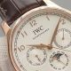 Replica IWC Portuguese Moonphase Gold Case White Face Watch (1)_th.JPG